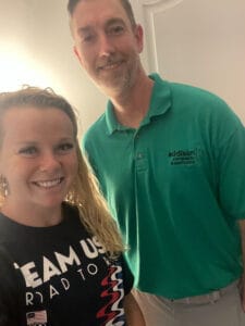 Macy Tarlton (left) and Dr.Jason Addison (right) smile in a selfie.